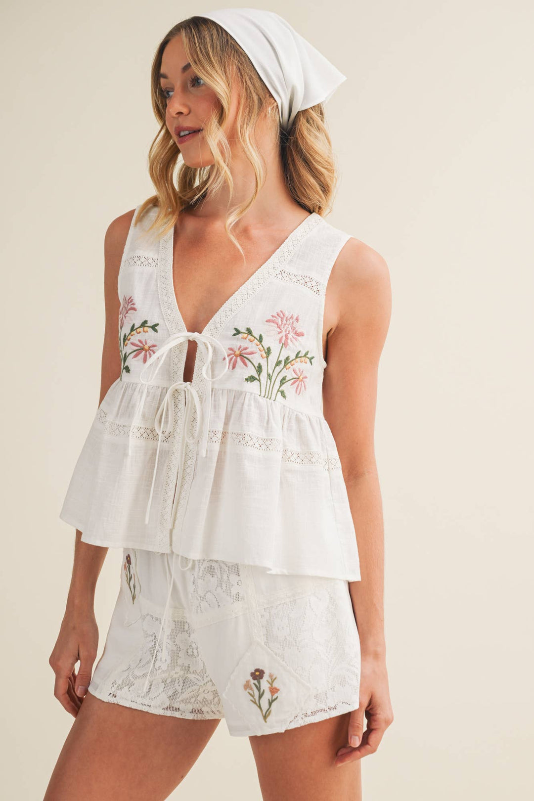 Ashlynn Floral Peplum Vest - Baycreek & Co