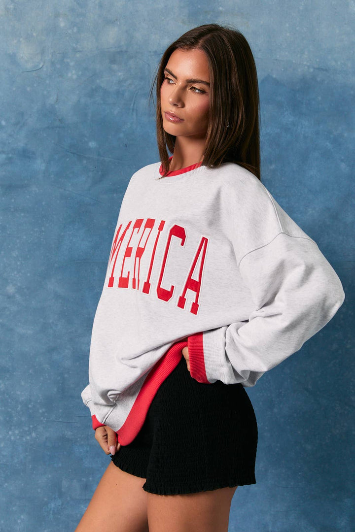 "AMERICA" LONG SLEEVE CREW NECK OVERSIZED SWEATSHIRT - Baycreek & Co